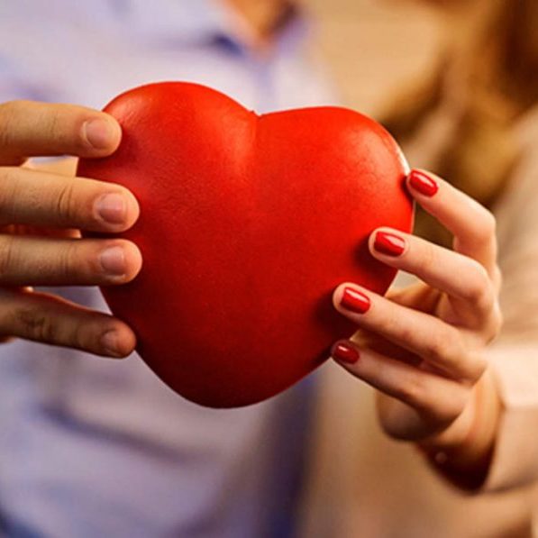 Couple-holding-heart-iStock-889592426